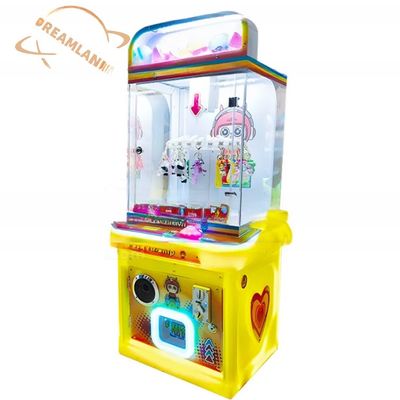Harga yang bagus Dreamland Mini Coin Dioperasikan Murah Hiburan Hadiah Mesin Game Anak-anak Clip Sticker Kartu Clamp Mesin on line