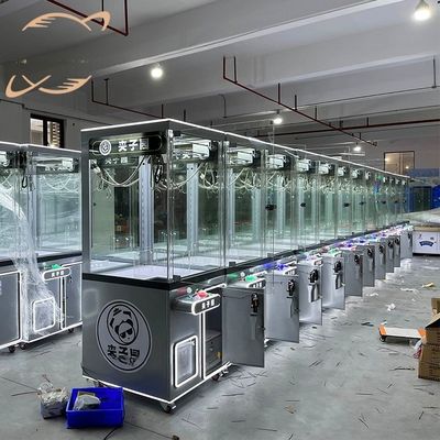 Bom preço Dreamland Parque de diversões exclusivo Máquina de jogo operada por moedas Venda de brinquedos Arcade Máquina de guinada de garra com aceitador de contas on-line